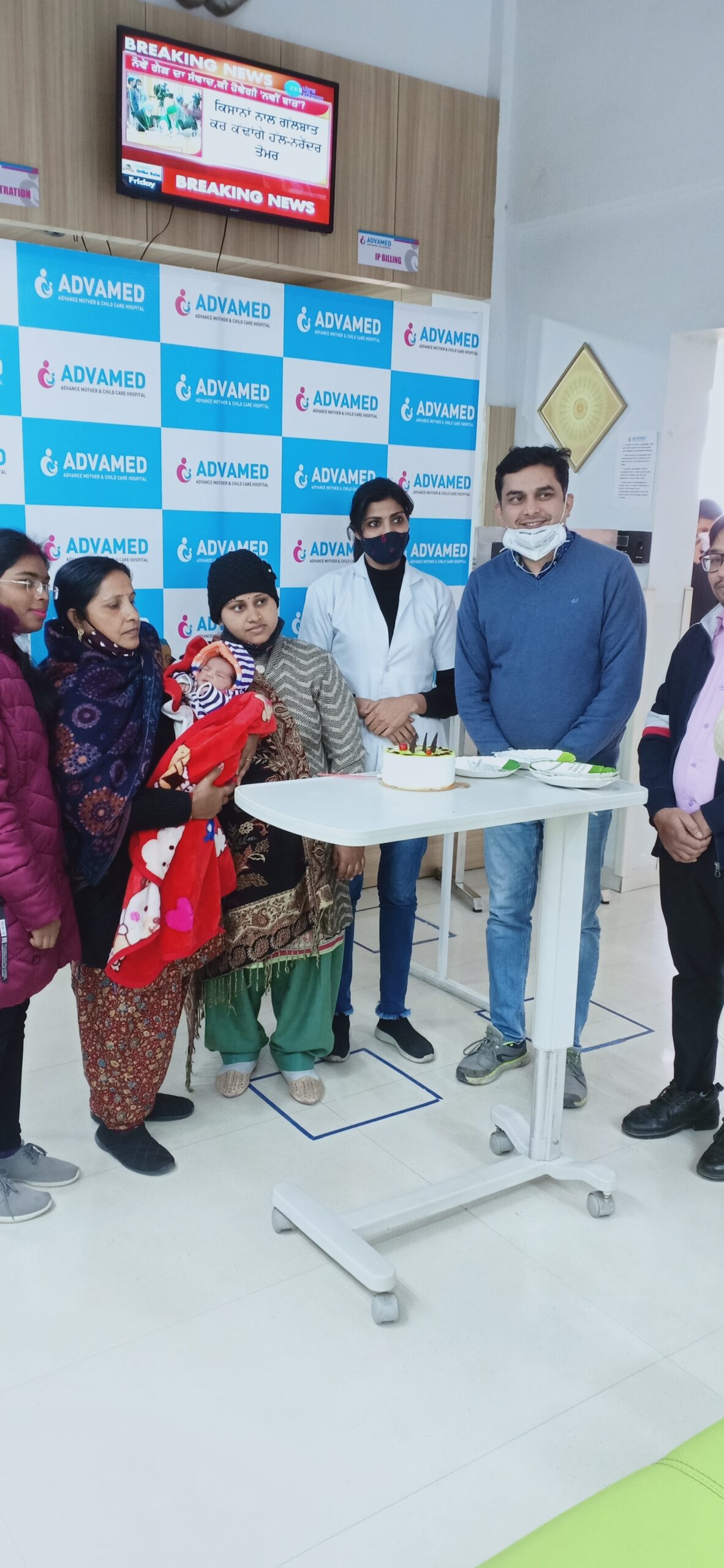 Happy family with newborn baby after successful IVF treatment at AdvaMed Hospital